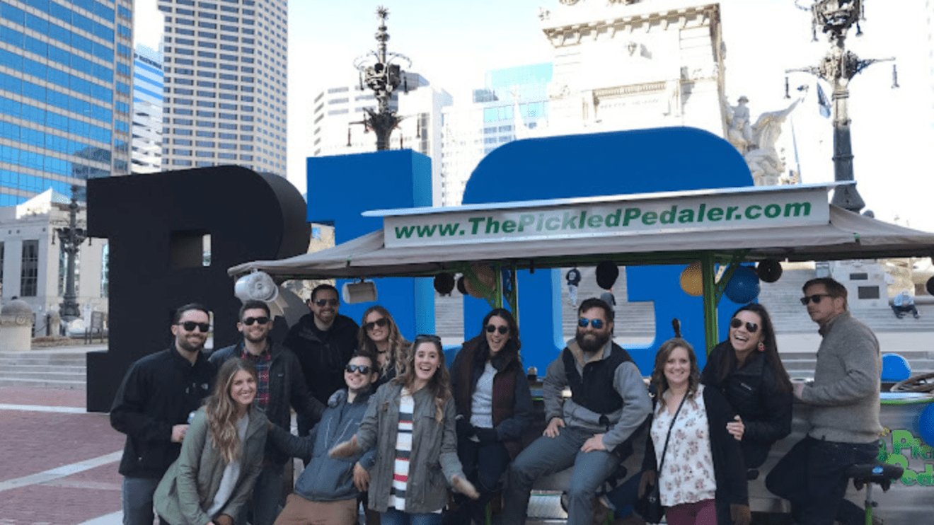 a group of people standing in front of a building